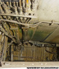 Port main gear bay, inner area; this is the area hidden by the large door that cycles shut once the gear is down and is where the wheel would retract to. Left of photo is forward. Port main gear bay, inner area; this is the area hidden by the large door that cycles shut once the gear is down and is where the wheel would retract to. Left of photo is forward.